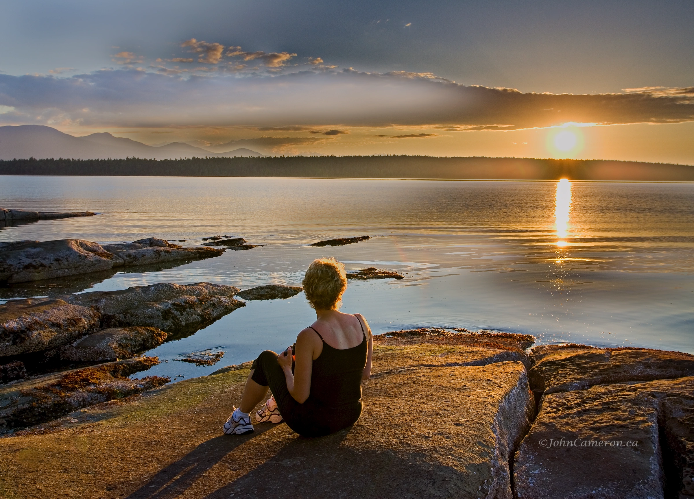 Lone Woman at Arbutus Beach Access, Southey Point Road, Saltspring Island ©johncameron.ca